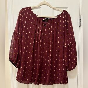 Wine colored blouse with gold accents